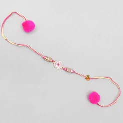 Clearance Pink Rakhi Adorned With An Embossed Swastik BOY Rakhis | Rakhis