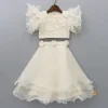Hot Ruffle Sleeves Off White Embroidered Top And Layered Lehenga Ethnic Wear | Lehengas & Ghagras